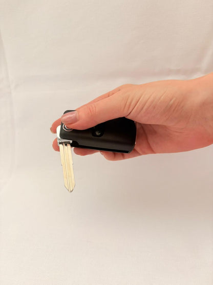 HPand holding a ajero Key convert to Flip Key Remote